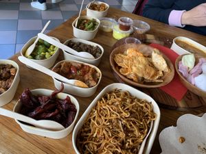 The rice table for two persons. There were actually more dishes than the picture shows.  at De Vegetarische Toko in The Hague