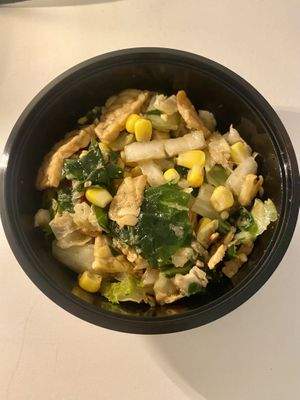 Special dish with tempeh, corn and cabbage  at De Vegetarische Toko in The Hague