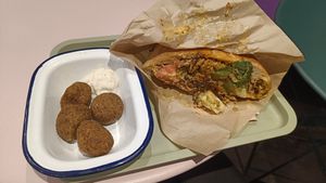 Vebab with bread and falafels as sides. at Gustavo in Grenoble