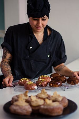 Rose water pistachio donuts stuffed with coconut whipped cream  at Grumpy & Runt in Western Cape