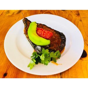 “Karnıyarık” the Turkish traditional meal. It is eggplant with vegan protein or meat in the center; depending on your preferences. at Hanimeli in Istanbul