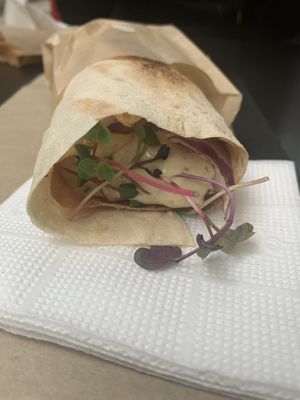 Eggplant with smoked tofu wrap  at Veganuti in Kyiv