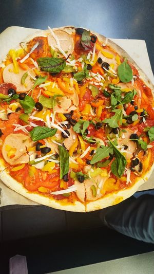 Фірмова піца без цибулі at Veganuti in Kyiv