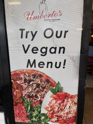 A large vegan sign outside of the restaurant!  at Umberto's in Plainview