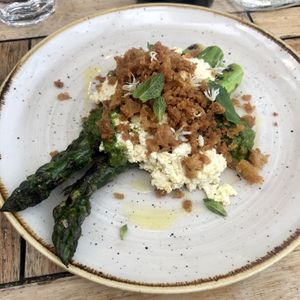 Asparagus with vegan ricotta and bread crumbs .  at Peachy Goat in South East London