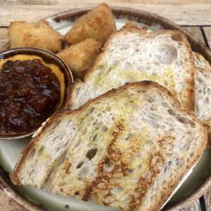 Deep fried Camembert with apple chuntney and sourdough toast .  at Peachy Goat in South East London