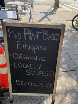 Street sign at Ras Plant Based in Brooklyn