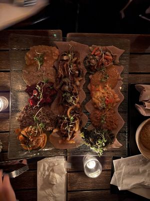 2 platters and the mushroom tibs  at Ras Plant Based in Brooklyn