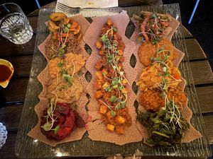 Piassa, mama’s tofu, mercato  at Ras Plant Based in Brooklyn