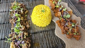 Soy kifto (left), turmeric rice (middle), and seitan tibs (right) at Ras Plant Based in Brooklyn
