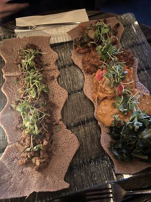 Kitfa injera and the platter  at Ras Plant Based in Brooklyn