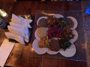 Injera and Platter for two at Ras Plant Based in Brooklyn