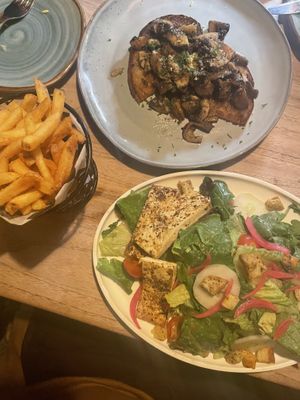 Mushroom toast(made vegan), fries, and salad with tofu added.   at Kome in Willemstad