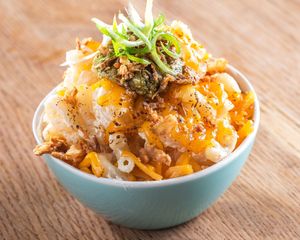 Mac and Cheeze (side)

Macaroni, butternut cashew cheeZe sauce, crispy jalapeños, homemade pesto. at Guerrilla Burger in Toronto