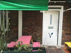 Door   at Iom Cocina Plant-Based in Bogota