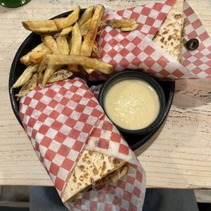 Shawarma with “chicken”, pico de gallo, black olives and spinach   at Iom Cocina Plant-Based in Bogota