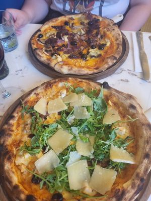 Pizza at top is Vegan option with Mushrooms  Artichokes Onions Olives sundried Tomatoes and Vegan Cheese at The Chubby Cherub in Belfast