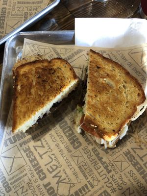 Full vegan grilled cheese with some veggies  at Meltz in Coeur D Alene