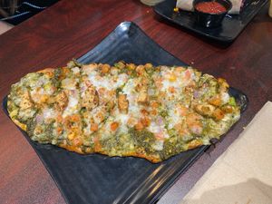 Cauliflower crust bread with pesto! 😋 at Copper Branch in Vancouver