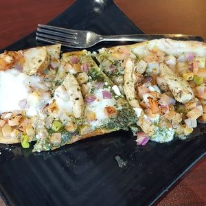Cauliflower crust flat bread with pesto at Copper Branch in Vancouver
