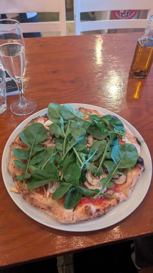 Quatro fungi pizza with rocket salad added and some chili oil!! at Parco Della Pace  in Hiroshima