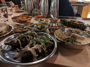 Grilled eggplant in front, salatim and mushroom in back (all vegan) at Laser Wolf in Philadelphia