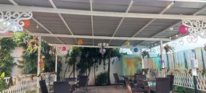 Roofed outdoor sitting area ( I ) #Veganuary at Loving Hut in Abidjan