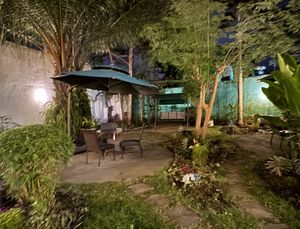 Dining in the gardenn  at Loving Hut in Abidjan