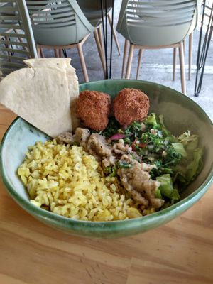Rice, garbanzo balls, salad, baba ganoush at INA Restaurante in Medellin