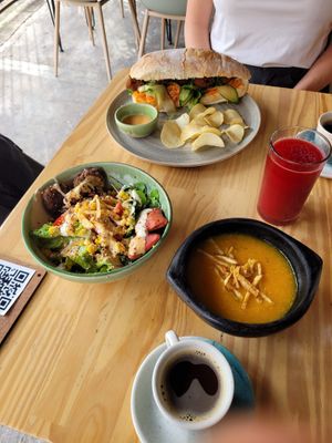 Menu del día, bahn mi, coffee  at INA Restaurante in Medellin