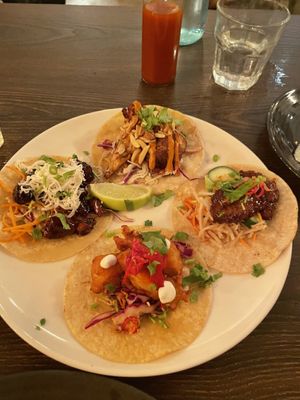 Tacos (clockwise) - cauliflower, crispy chicken, popcorn prawn and Korean eggplant  at Vandal in Newtown