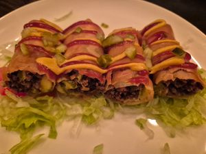 Cheeseburger springroll $18.00: really loved it! love the mince and melty cheese, with the shredded lettuce at Vandal in Newtown