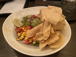 Guacamole w/ pico de gallo, lime, chilli, and heirloom corn totopos  at Vandal in Newtown