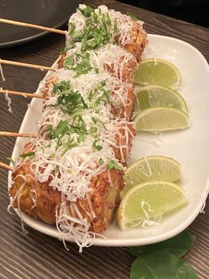 Chargrilled corn w/ chipotle tahini, smoked hemp queso, chilli salt, lime, & coriander  at Vandal in Newtown