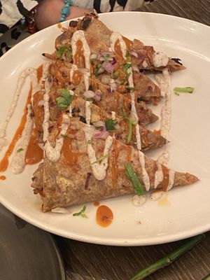 “Chicken” and mushroom quesadilla w/ a buckwheat and chia tortilla, chipotle vinaigrette, sumac yoghurt, queso, onion, lime, and coriander salsa  at Vandal in Newtown