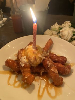 Churros with dulce de leche, cinnamon sugar, coconut gelato, toasted coconut flakes  at Vandal in Newtown