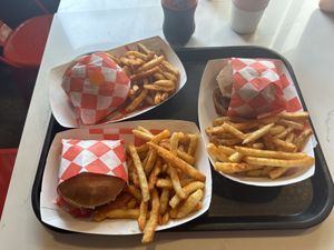 Hot chicken mama pop up: got the medium and hot chicken sandwiches with friess  at Peach and Pine in St James