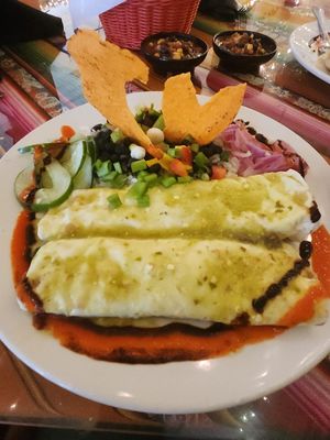 Susu's Enchiladas (substitute the chicken for black beans or rice, omit the cheddar cheese and cream cheese) at Rolando's in Hot Springs