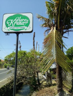 signboard on roadside  at Hare Krisna in Denpasar