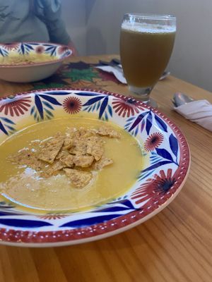 Soup & drink from lunch menu  at Madreselva in Bogota