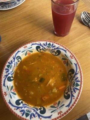 Soup and juice from menu del día. The juice was not great. Too watery and needed a touch of sugar  at Madreselva in Bogota