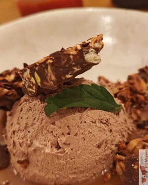 a chocolate ganache, with fleur de sel caramel, dark chocolate granola with timut pepper and a leaf with a taste of honey!
 at Dis Leur in Bordeaux