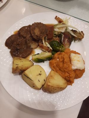 Roast, potatoes, sweet potato, sprouts  gravy and cranberry sauce. at Sausage Party in Toronto