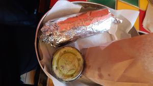 Vegan burrito, chips and guacamole  at Amelia's Taqueria in Boston