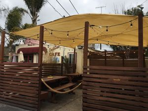 pretty outside seating with heat lamps  at 5 Mile Buzz House in Corralitos