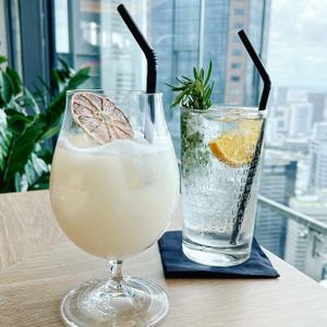 Gin based cocktail- summersop , botanist g&t at Artemis in Central Singapore