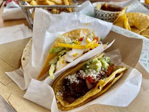 Carne asada and dorado. The dorado is a fried mashed potato taco and it was definitely my favorite!! at Tacotarian - Downtown LV in Las Vegas
