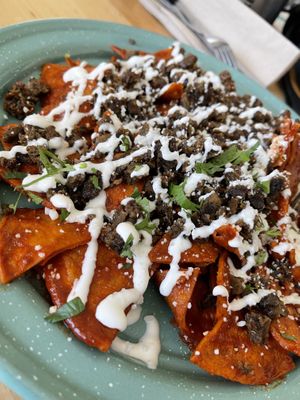 Chilaquiles - just ok. Not enough beans  at Tacotarian - Downtown LV in Las Vegas