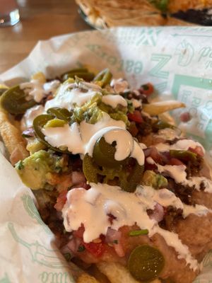 Asada fries - these are the bom! at Tacotarian - Downtown LV in Las Vegas