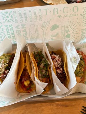 Tacos from left to right: carne asada, al pastor, barbacoa, chorizo, baja  at Tacotarian - Downtown LV in Las Vegas